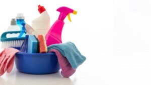 cleaning supplies isolated against white background copy space
